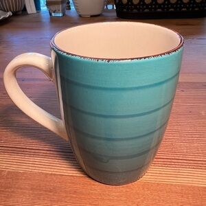 Royal Norfolk mug. It’s Teal Turquoise Swirl with Brown Trim.